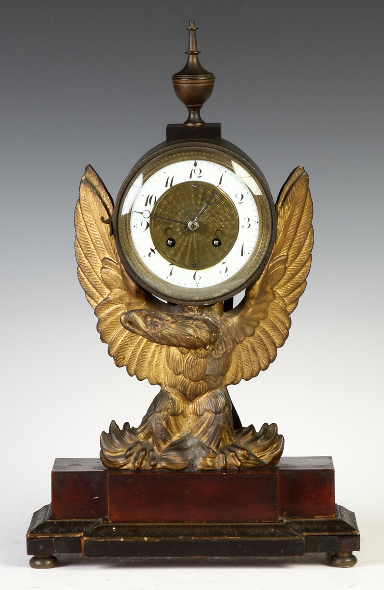 Appraisal: French Empire Carved Gilded Eagle Shelf Clock Early th cent