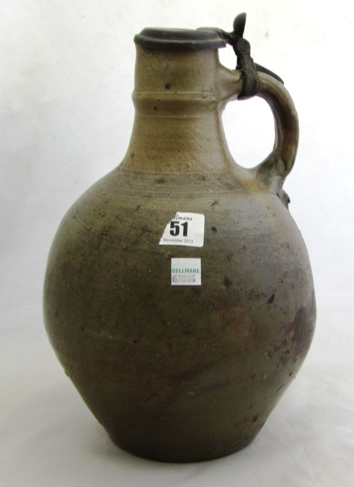 Appraisal: A German stoneware Bellarmine jug with pewter mounts cm high