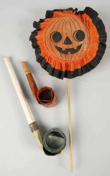 Appraisal: Lot of Halloween Noisemakers Description Includes one rattle pumpkin head