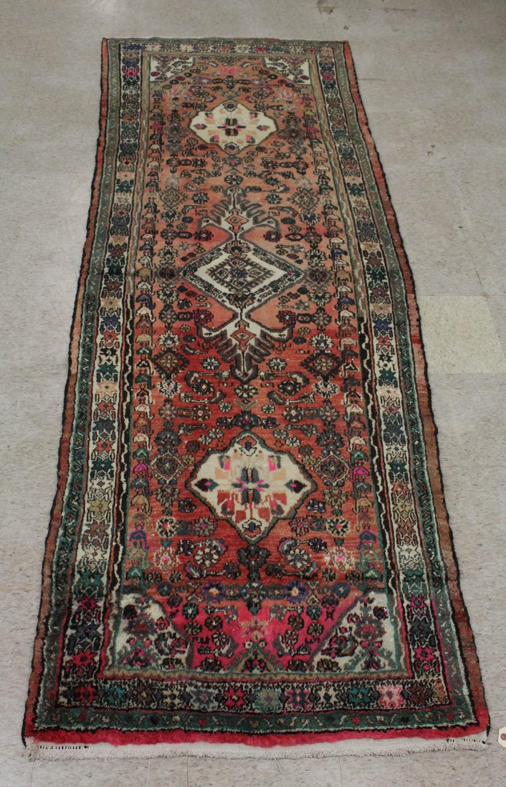 Appraisal: SEMI-ANTIQUE PERSIAN AREA RUG triple medallion and overall floral design