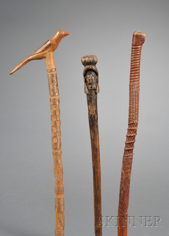 Appraisal: Three Carved and Painted Walking Sticks America th century one