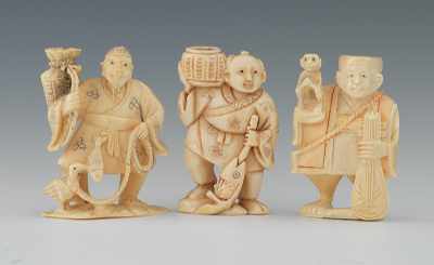 Appraisal: A Group of Two Carved Ivory Netsuke and One Okimono