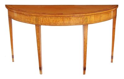 Appraisal: A George III satinwood console table the demi-lune top with