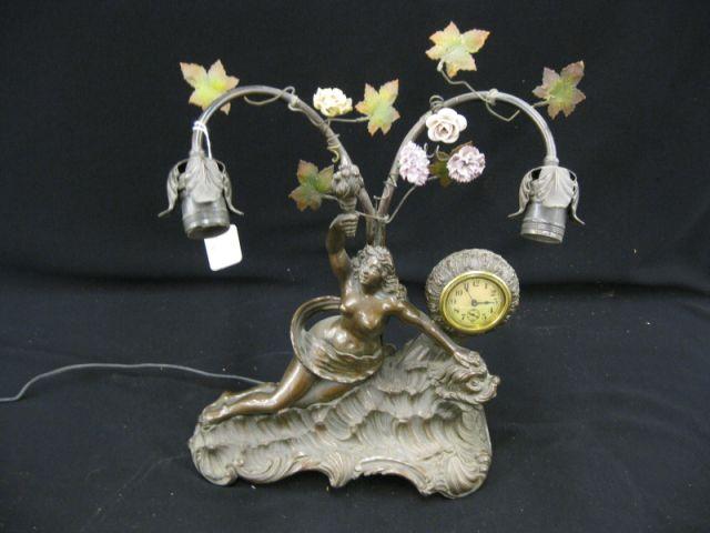 Appraisal: Art Nouveau Bronzed Figural Lamp with clock nude lady emerging