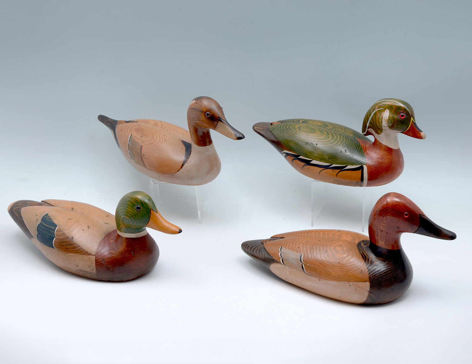 Appraisal: RIVERBEND CARVED DUCK DECOYS - carved painted ducks by Riverbend