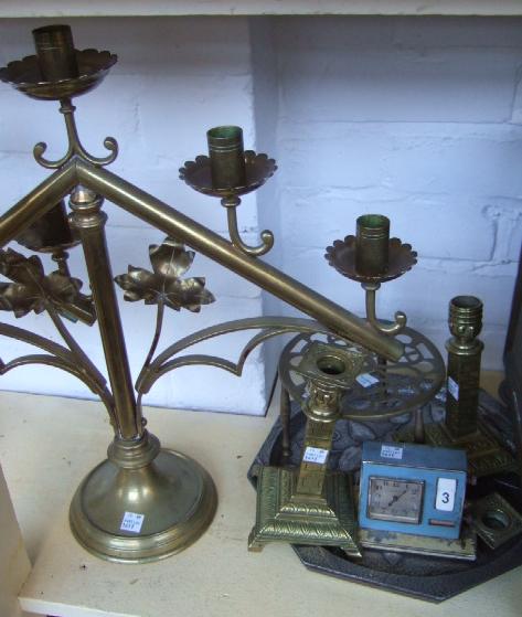 Appraisal: A pair of brass five branch candelabra of Gothic style