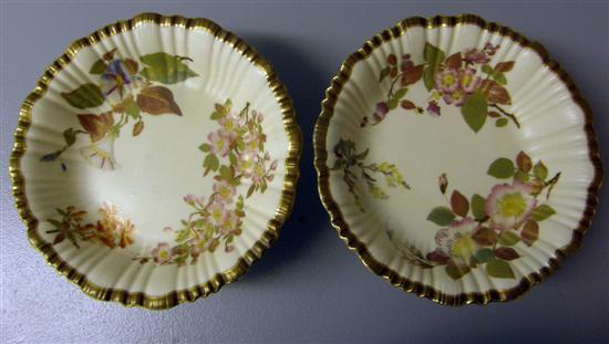 Appraisal: Two th century Royal Worcester bowls raised on three feet