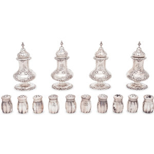 Appraisal: A Group of Sixteen Silver Casters comprising four large and