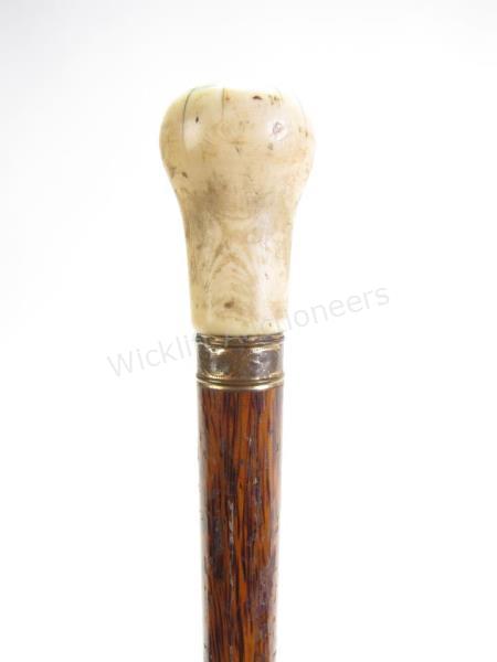 Appraisal: Dress Cane with Gold Collar solid wood shaft cane with