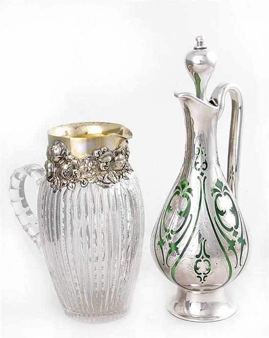 Appraisal: Shiebler sterling-mounted cut-crystal pitcher and silver-overlay decanter circa ornate rose