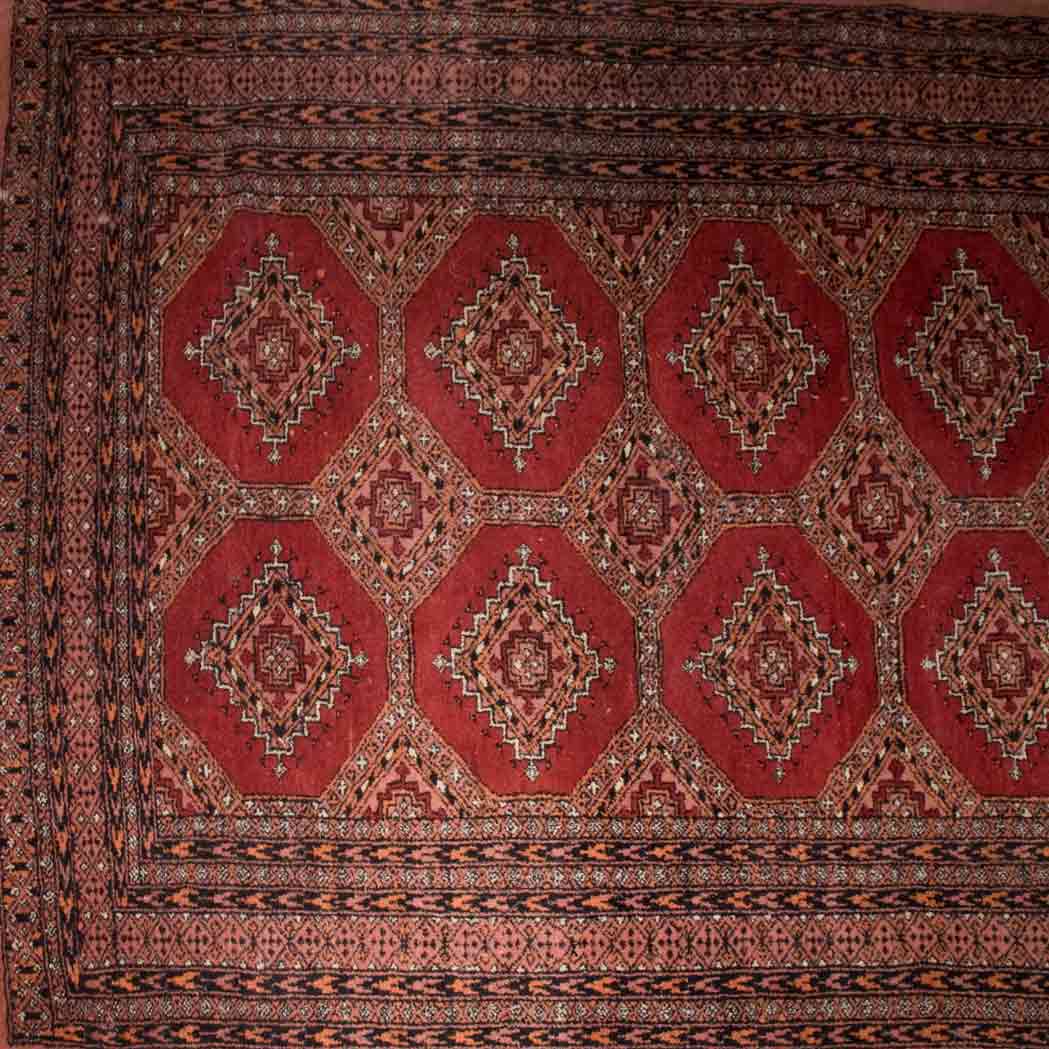 Appraisal: Group of Three Miscellaneous Rugs Comprising two Pakistan bokhara rugs