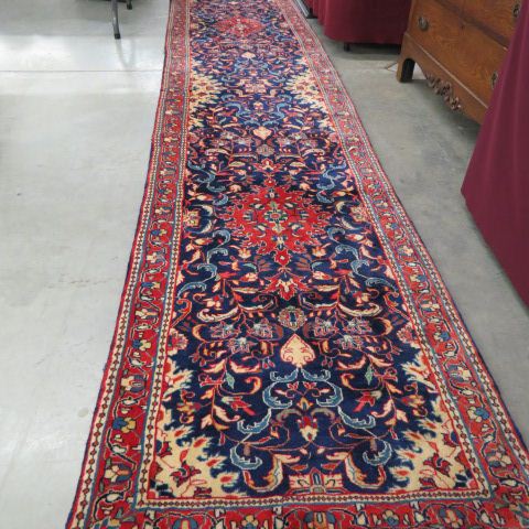 Appraisal: Sarouk Persian Handmade Runner elaborate floral on rich blue field