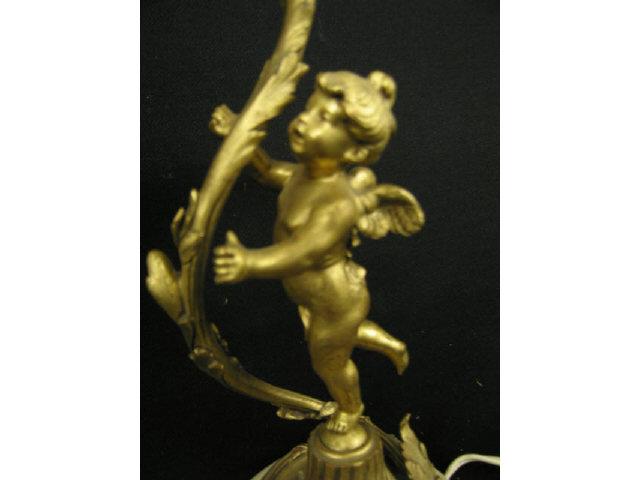 Appraisal: French Bronze Figural Cherub Lamps marble bases figural satin glass