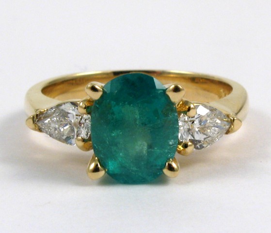 Appraisal: EMERALD DIAMOND AND YELLOW GOLD RING The k yellow gold