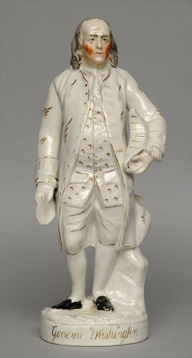 Appraisal: STAFFORDSHIRE FIGURE OF BENJAMIN FRANKLIN Modeled holding a tricorn hat