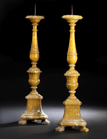 Appraisal: Tall Pair of Italian Provincial Turned Fruitwood Tripodal Pricket Candlesticks