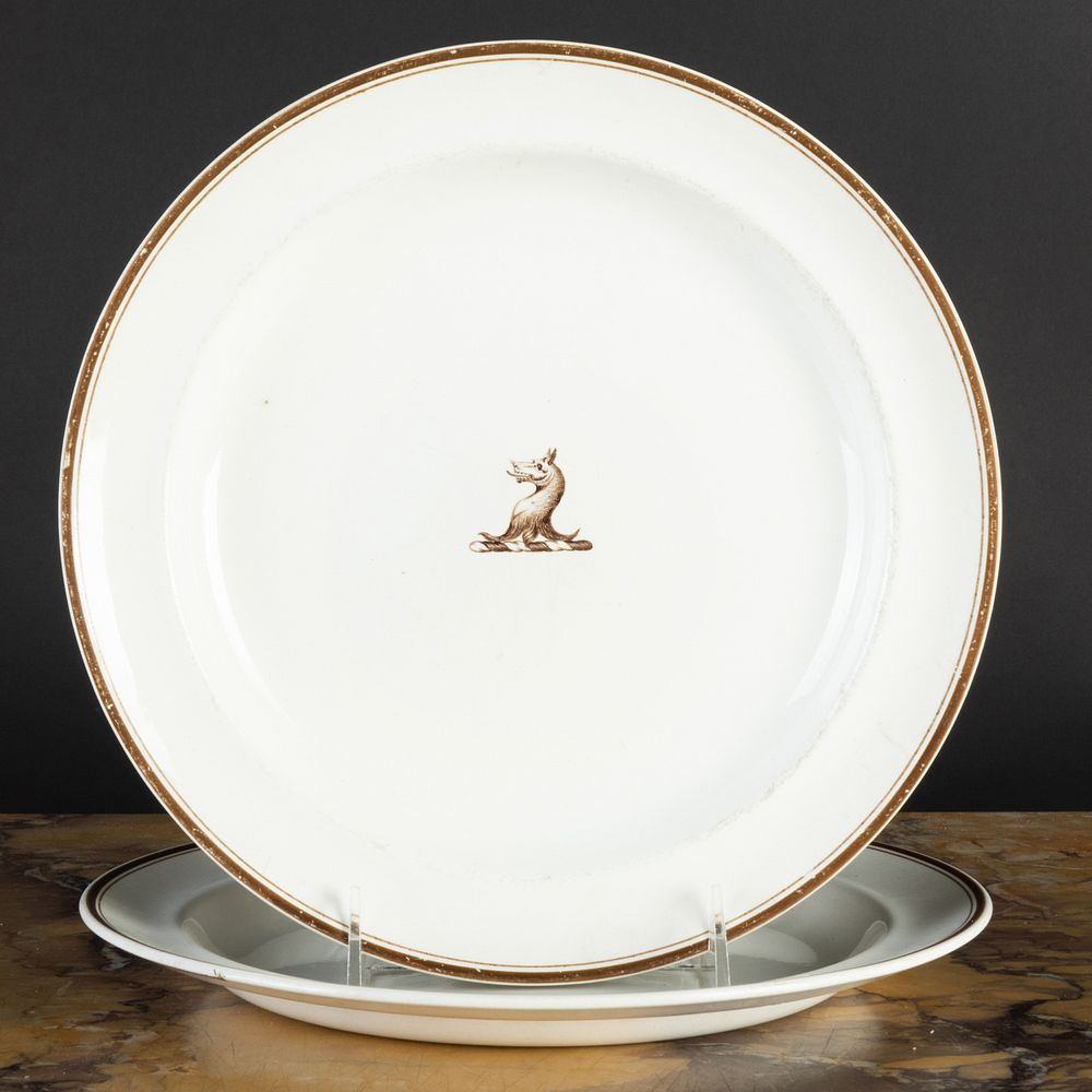 Appraisal: Pair of Wedgwood Creamware Plates with Sepia Crests Impressed marks