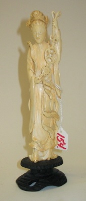 Appraisal: A CHINESE IVORY HAND CARVED FIGURE of woman standing holding