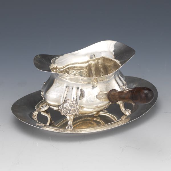 Appraisal: POOLE STERLING SILVER DOUBLE SPOUTED SAUCE BOAT x x sauce