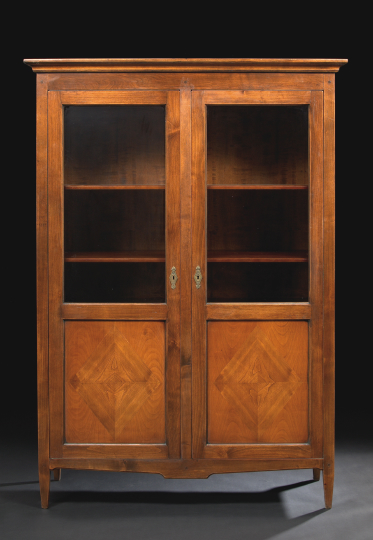 Appraisal: Louis XVI-Style Provincial Mahogany Bookcase the molded cornice above a