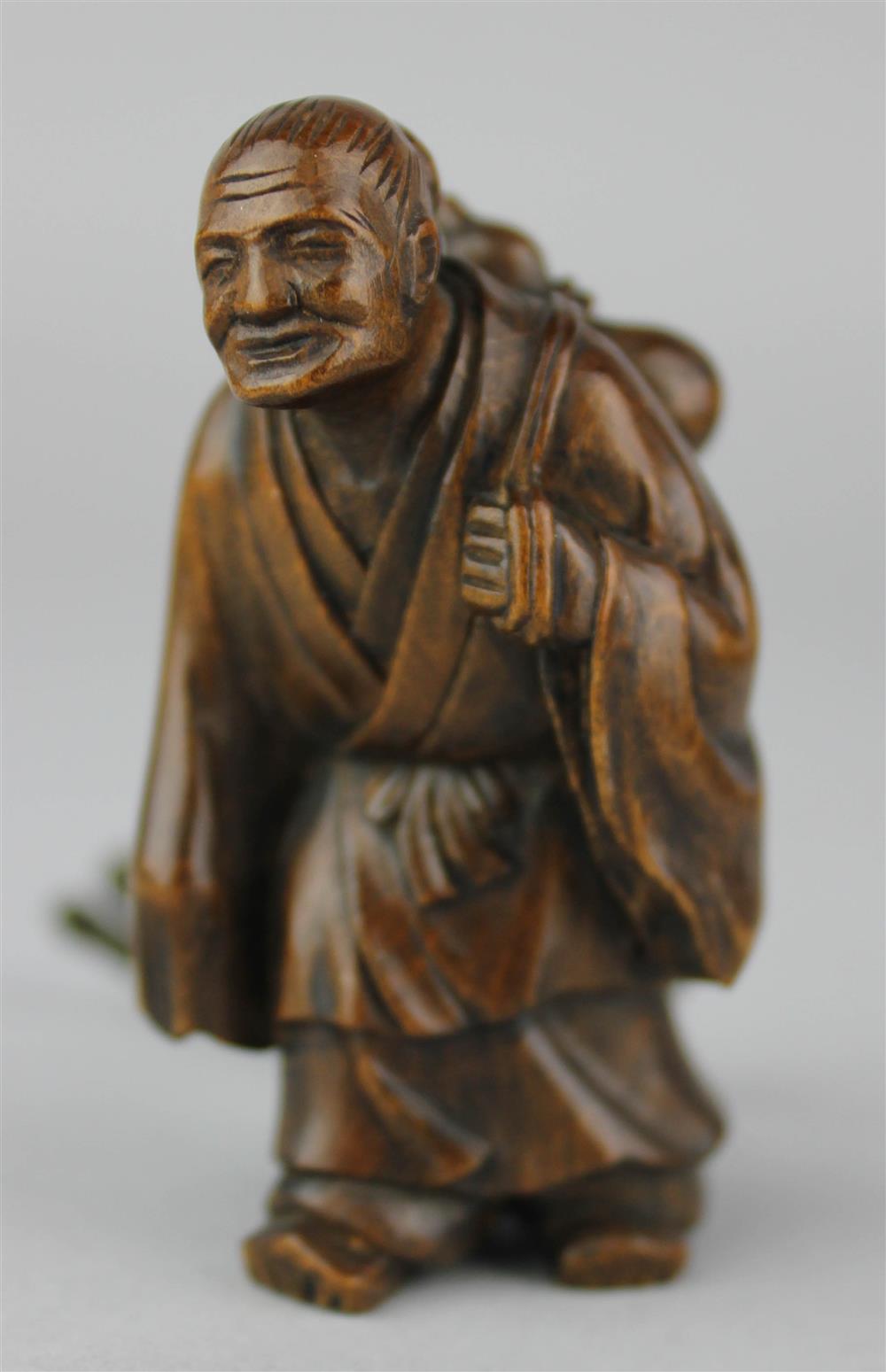 Appraisal: WOOD NETSUKE OF AN OLD MAN WITH A DOUBLE GOURD