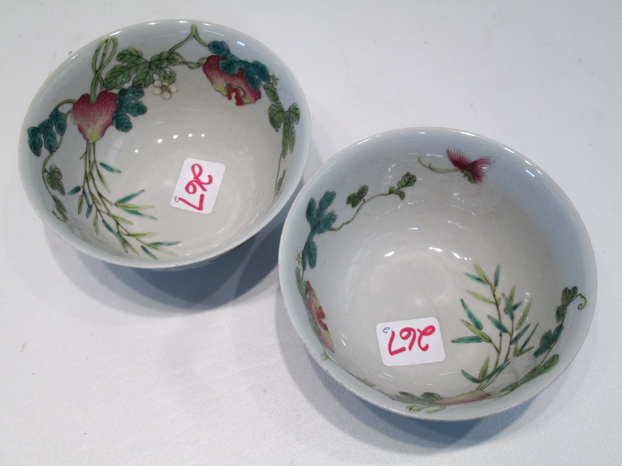 Appraisal: PAIR OF CHINESE QING DYNASTY PORCELAIN BOWLS each featuring an