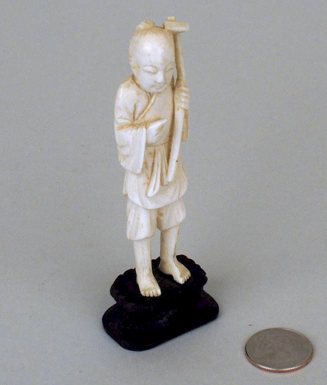 Appraisal: Chinese Carved Ivory Figure Man With Hoe Chinese carved ivory