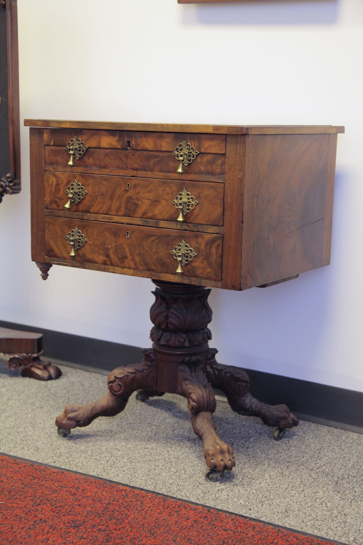 Appraisal: SEWING STAND England late th century Mahogany veneered stand having