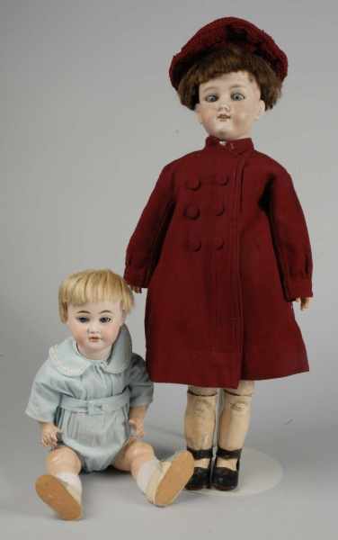 Appraisal: Lot of German Bisque Dolls Description Both with bisque socket