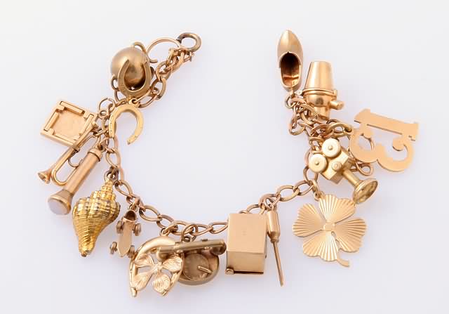 Appraisal: KY link bracelet with various K K gold filled gold-plated