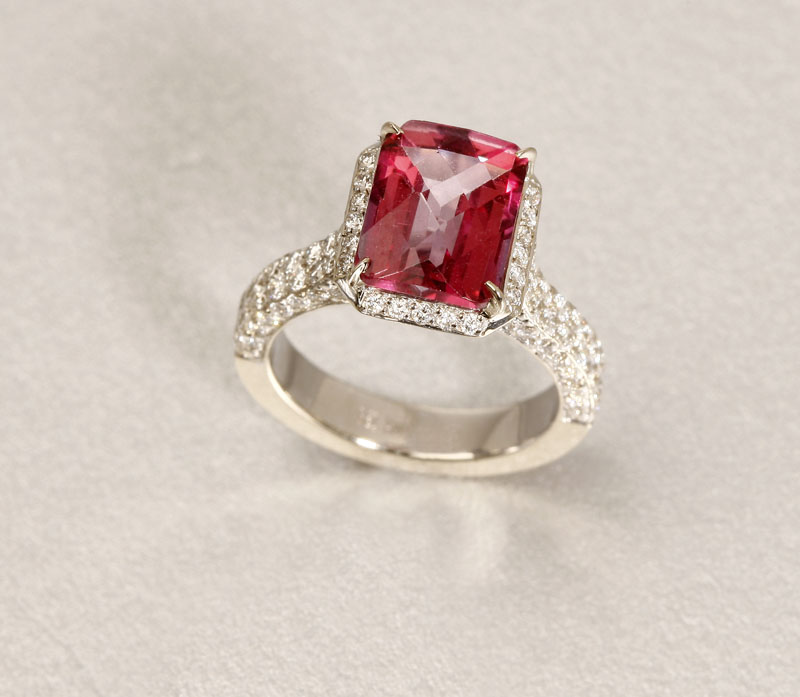 Appraisal: A K white gold pink topaz and diamond ring by