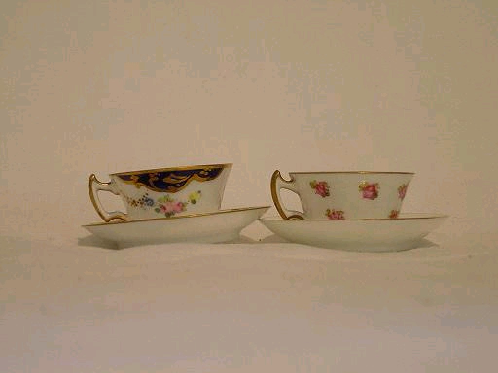 Appraisal: Two Royal Crown Derby miniature cabinet cups and saucers with