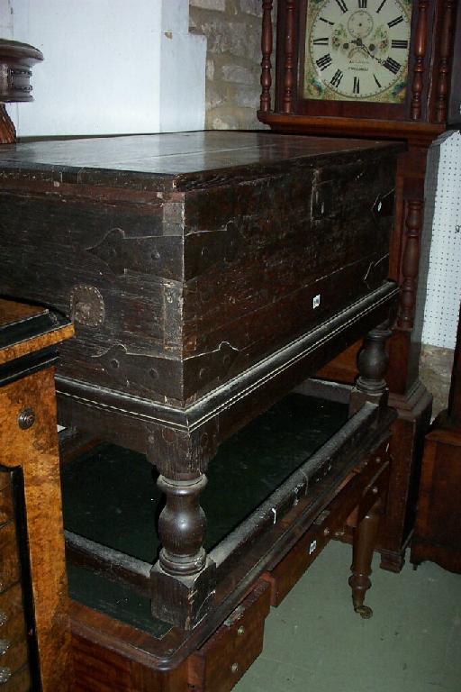 Appraisal: An th century oak strong box with ironwork straps fitted