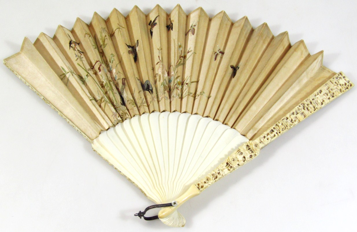 Appraisal: A thC ivory hand fan with heavily carved ends and