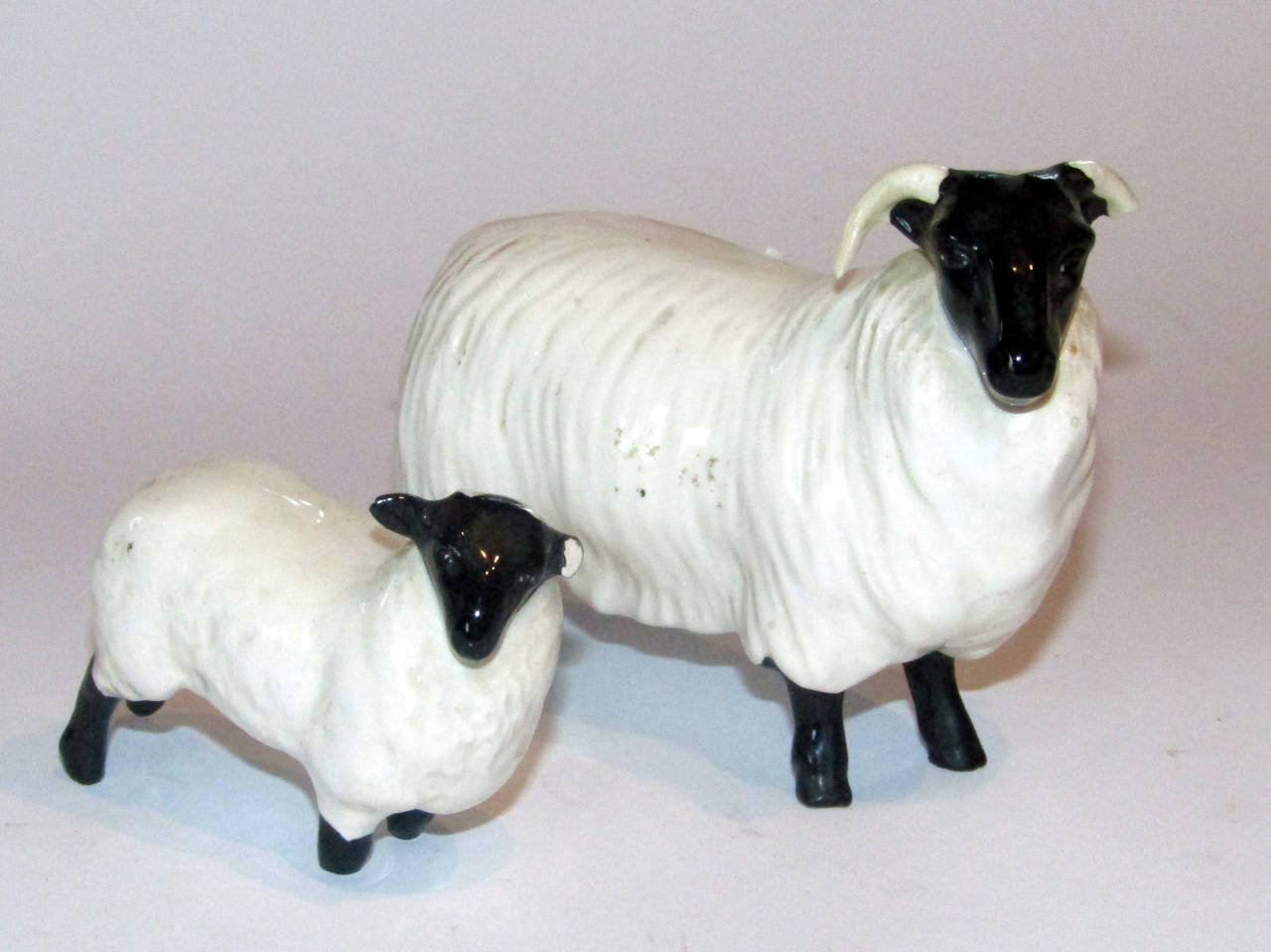 Appraisal: A thC Beswick pottery black faced ewe cm high and