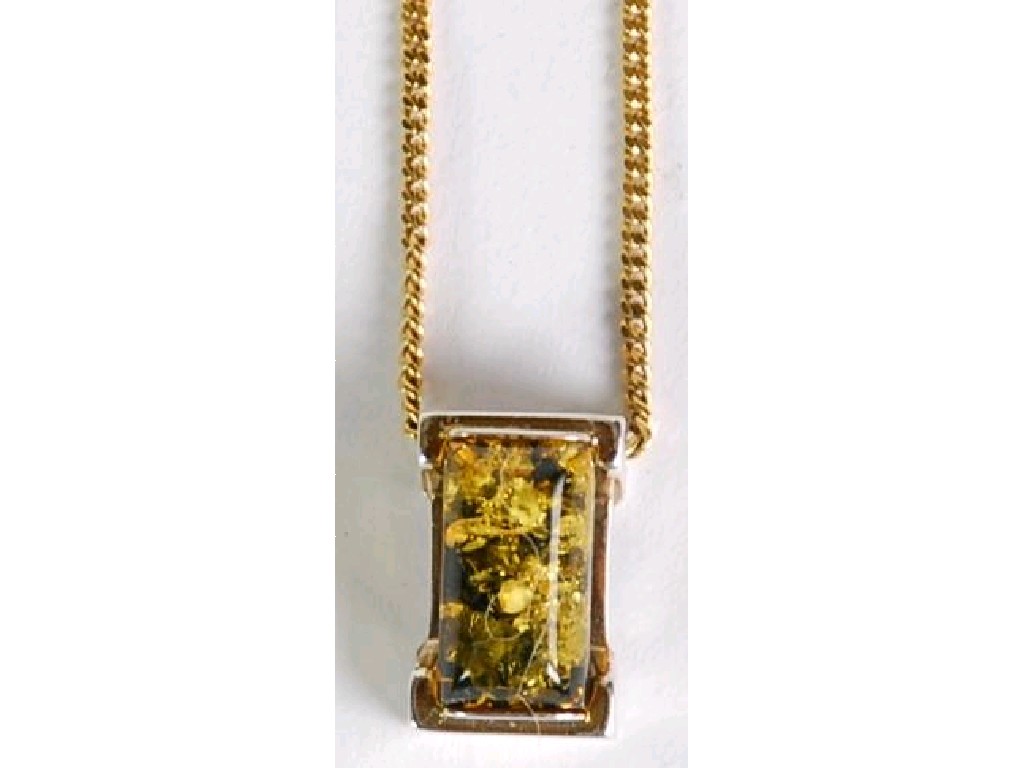 Appraisal: ct GOLD CHAIN NECKLACE and SMALL SILVER AND AMBER OBLONG