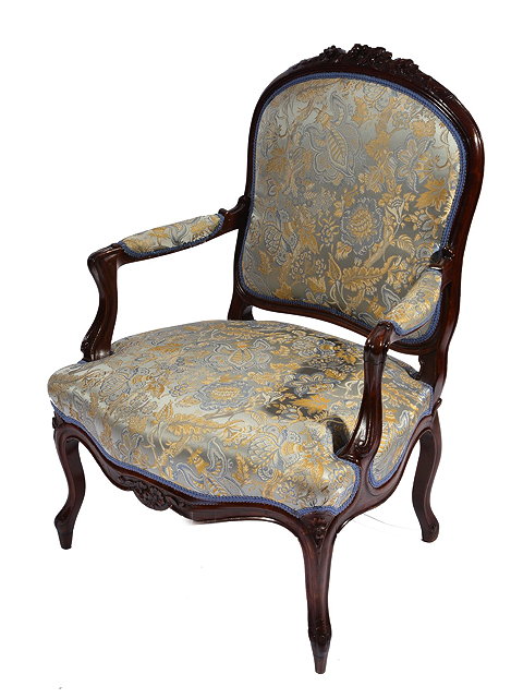 Appraisal: A GEORGE III OAK OPEN ARMCHAIR the arched back with