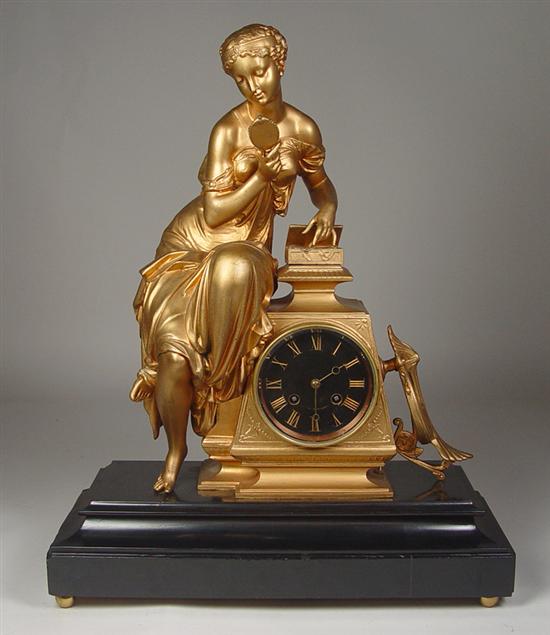 Appraisal: French Gilt Figural Clock Circa Black enamel Roman dial with