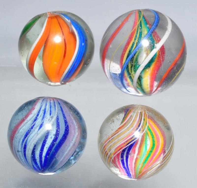 Appraisal: Lot of Swirl Marbles Description Includes two single ribbons one