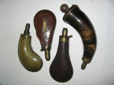 Appraisal: A HORN POWDER FLASK with brass adjustable nozzle and turned