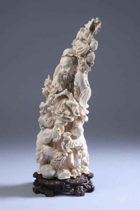 Appraisal: CHINESE IVORY FIGURAL GROUP Carved to depict man bird and