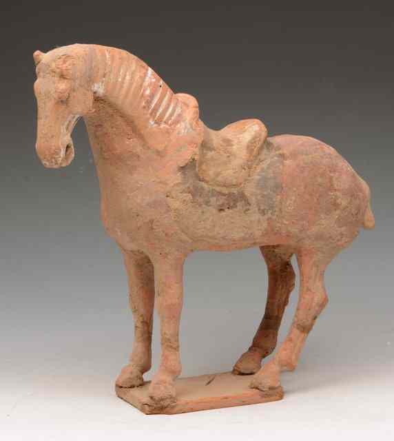 Appraisal: A PAINTED POTTERY MODEL OF A HORSE Tang Dynasty in