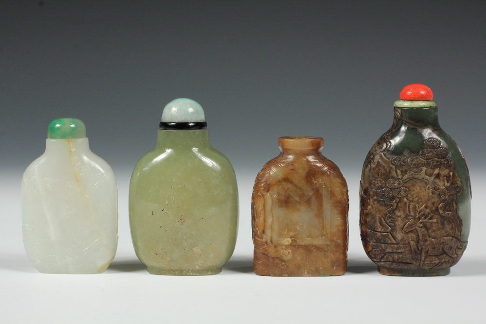 Appraisal: A GROUP OF JADE SNUFF BOTTLES - Including A Carved