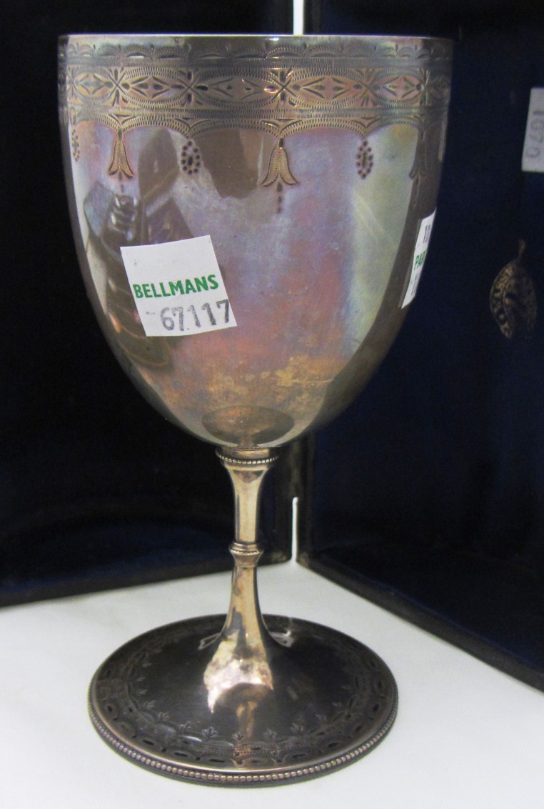 Appraisal: Silver comprising a Victorian goblet with engraved decoration presentation inscribed