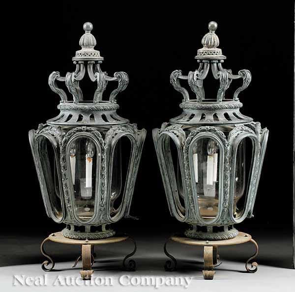 Appraisal: A Pair of Highly Decorative Venetian-Style Patinated Iron Lanterns scrolled