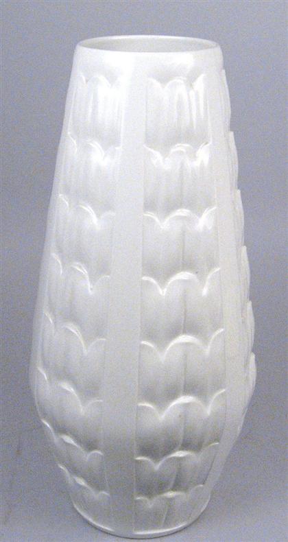 Appraisal: german Large porcelain art deco vase White with molded vertical