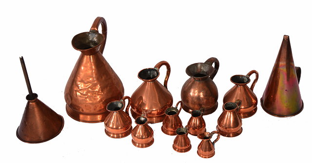 Appraisal: ELEVEN ANTIQUE COPPER MEASURING JUGS of squat form to include