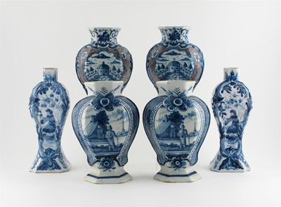 Appraisal: Three pairs of Dutch Delft vases one decorated with swans