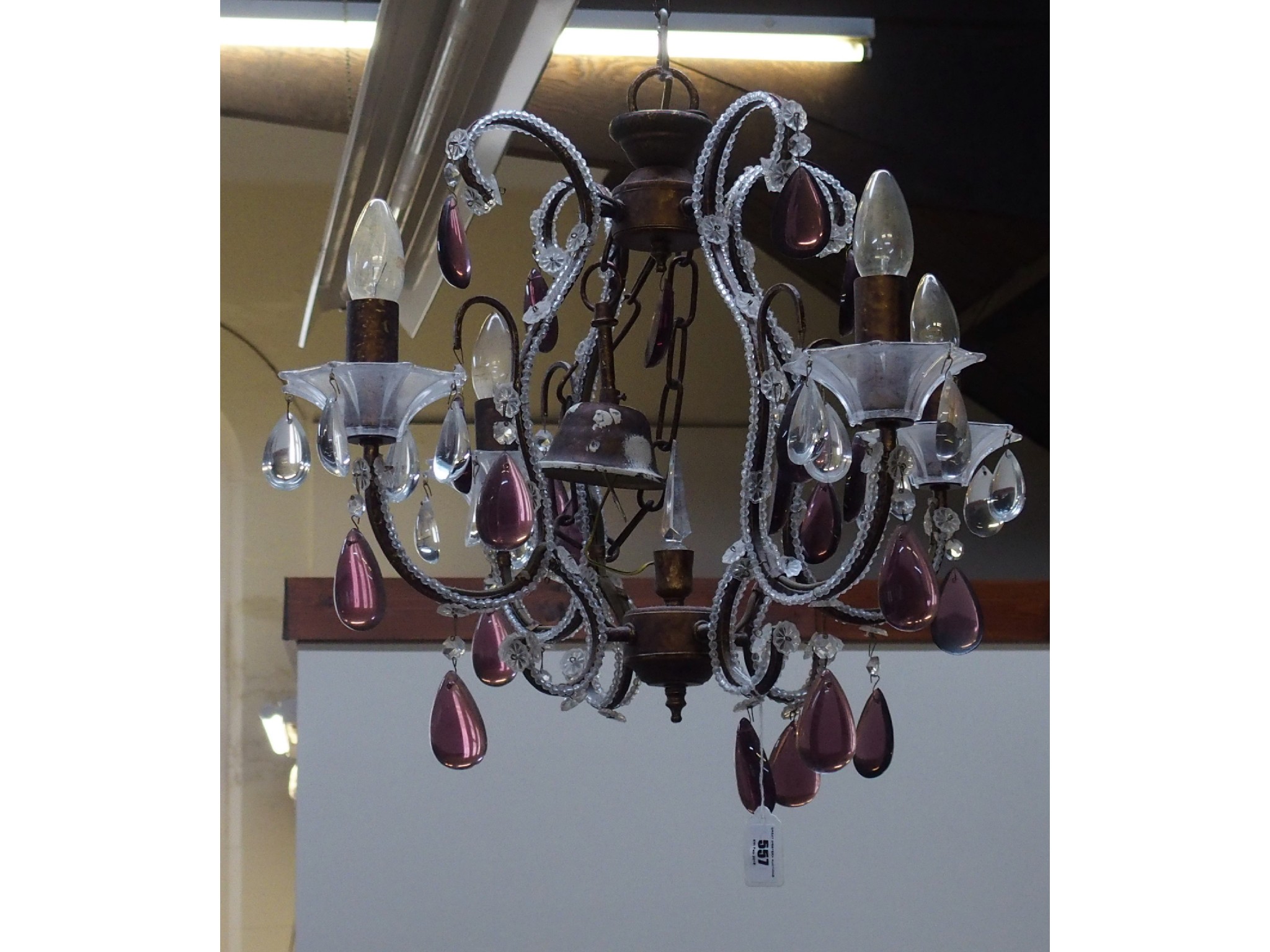 Appraisal: Three Branch chandelier with amethyst coloured and clear drops