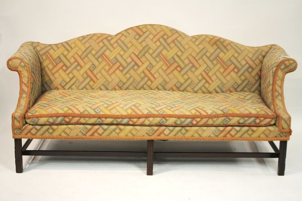 Appraisal: George III Style Mahogany Camelback sofa Upholstered in rust colored